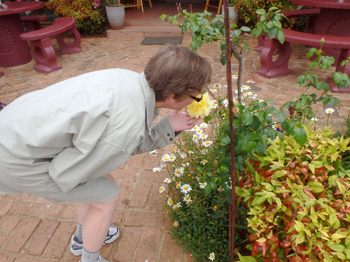 Terry never misses an opportunity to smell a rose.